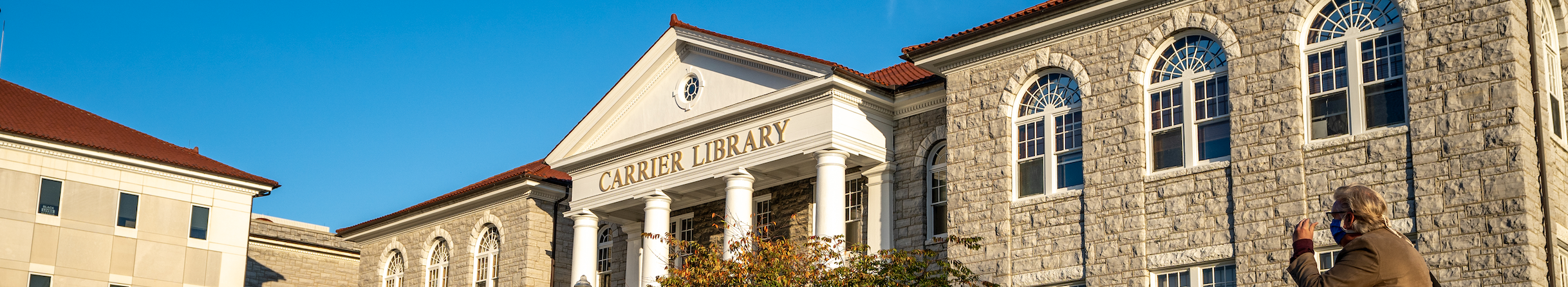 Photo of historic entrance to Carrier Library with columns and arched windows